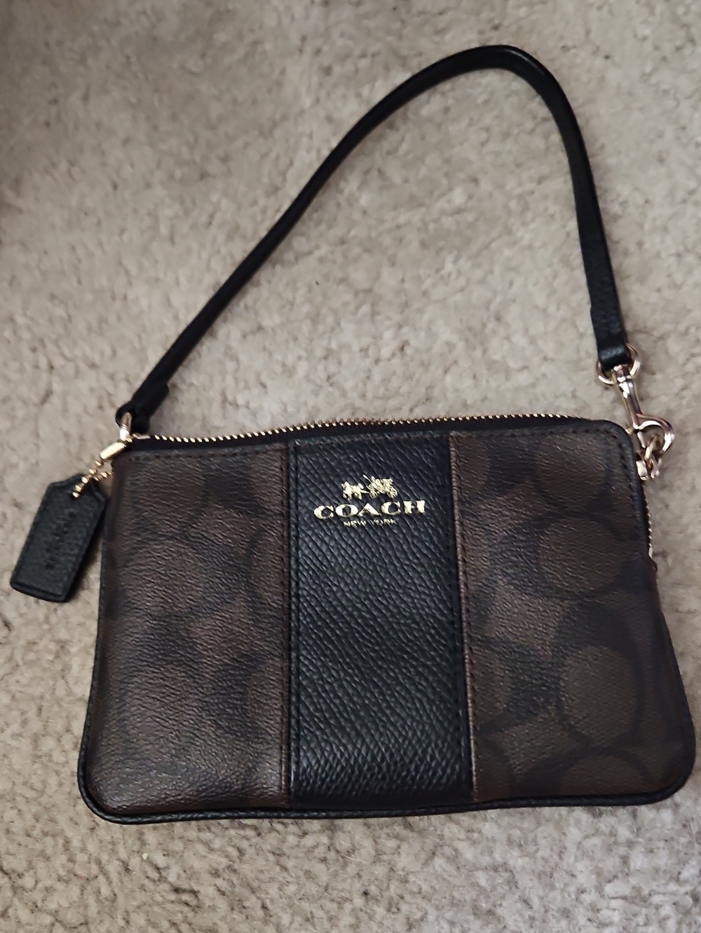 COACH Dark Brown Signature Wristlet with Black Center Stripe